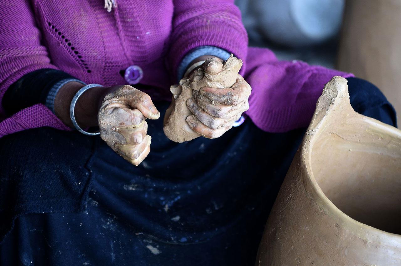 Sabiha Ayari, a Tunisian potter in her fifties, works in the village of Sejnane
