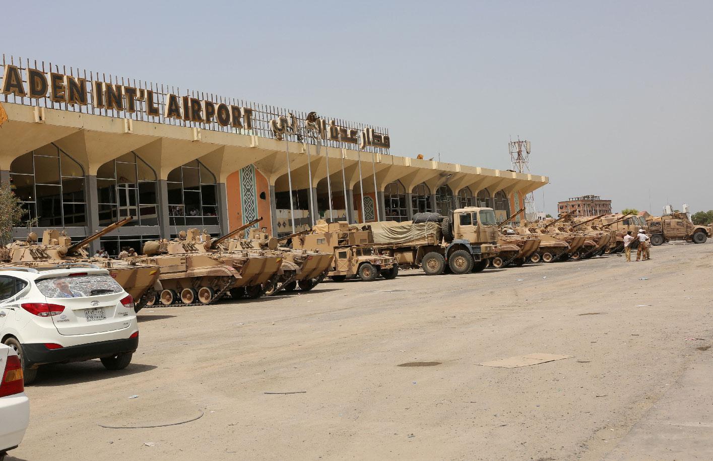 UAE military vehicles are seen at the international airport of Aden