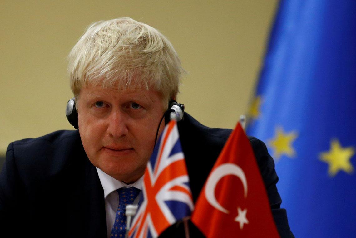 Then-foreign minister Boris Johnson attends a news conference in Ankara