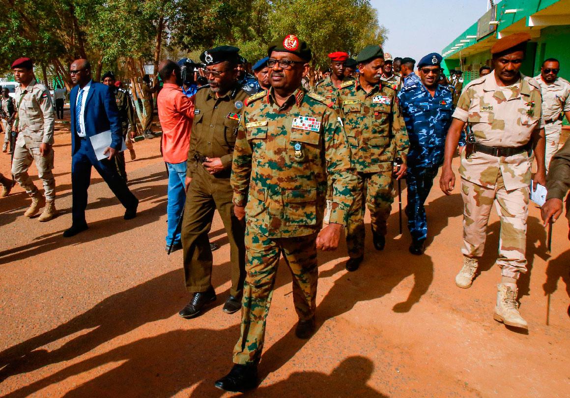 General Jamal Omar (C), a member of Sudan's Transitional Military Council (TMC), arrives to attend an official function in Omdurman