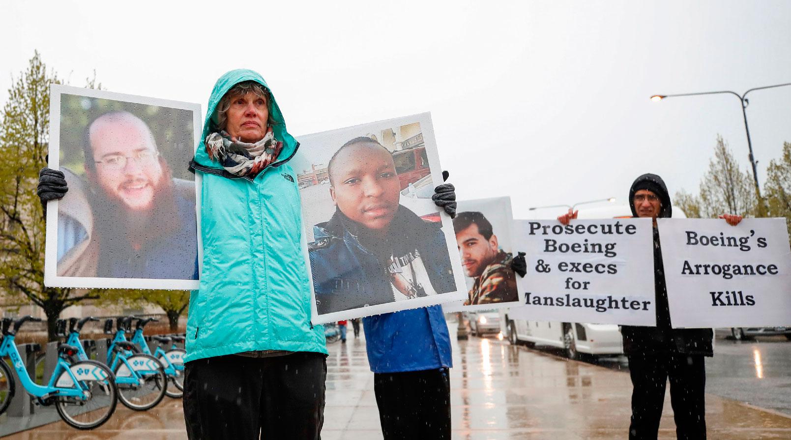 Family and friends of the Ethiopian Airlines Flight 302 Boeing plane crash victims hold a silent protest outside Boeing's annual shareholders meeting