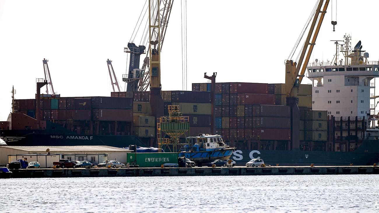 A container ship moored in the harbour of the eastern Libyan port city of Benghazi
