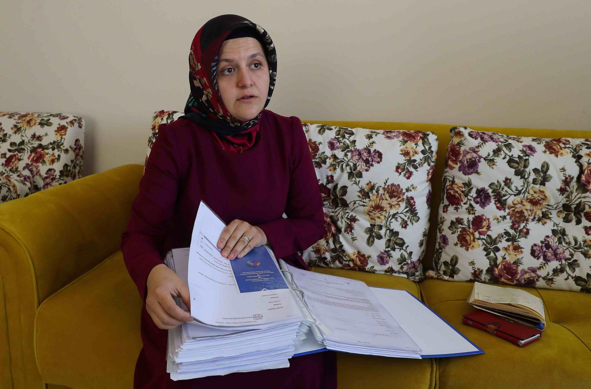 His wife, Sumeyye Yilmaz, says CCTV footage shows him being confronted outside their home after leaving for work