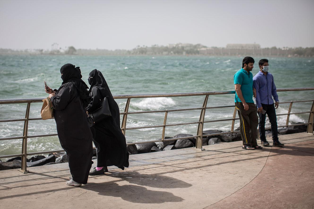 Saudi Arabian women take a picture at the corniche in Jeddah