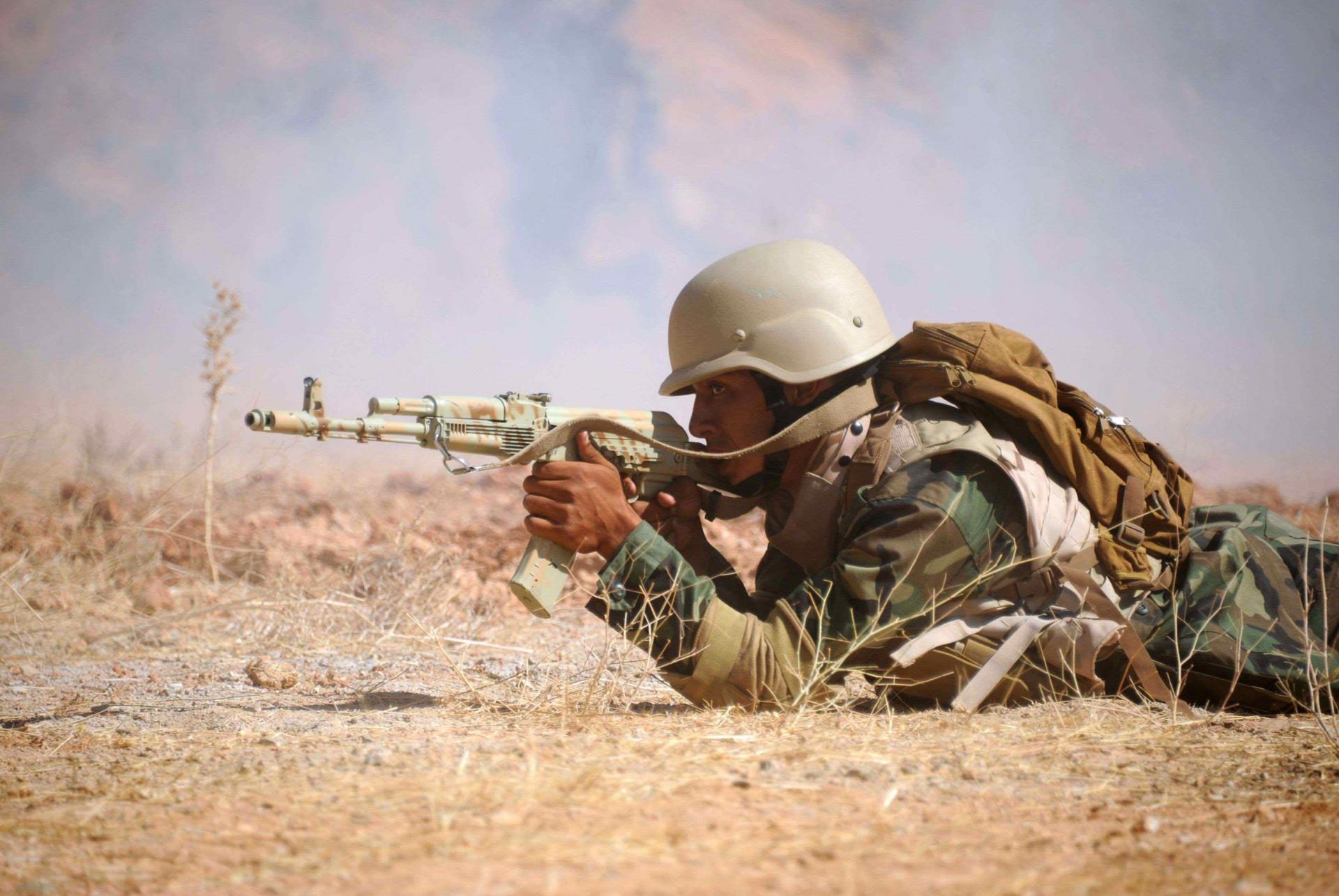 With the help of an Arabic translator, an adviser instructed troops on how to detect and defuse mines, while another trained them on treating war injuries