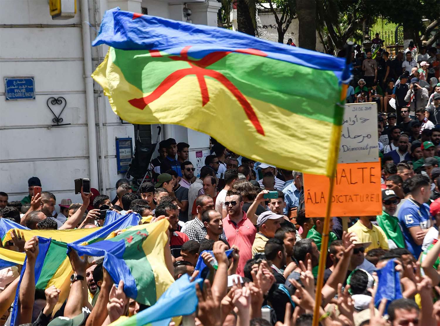 Amazigh flags waved during the weekly Friday demonstration in Algiers on June 21