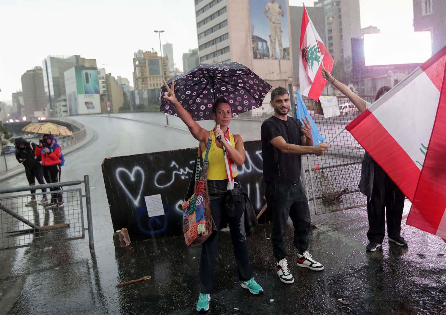 Flag-waving protesters kept roads blocked with vehicles and makeshift barricades 