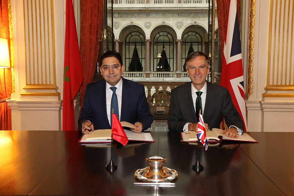 British Minister of State for the Middle East and North Africa, Dr Andrew Murrison and Moroccan Foreign Minister, Nasser Bourita (L)