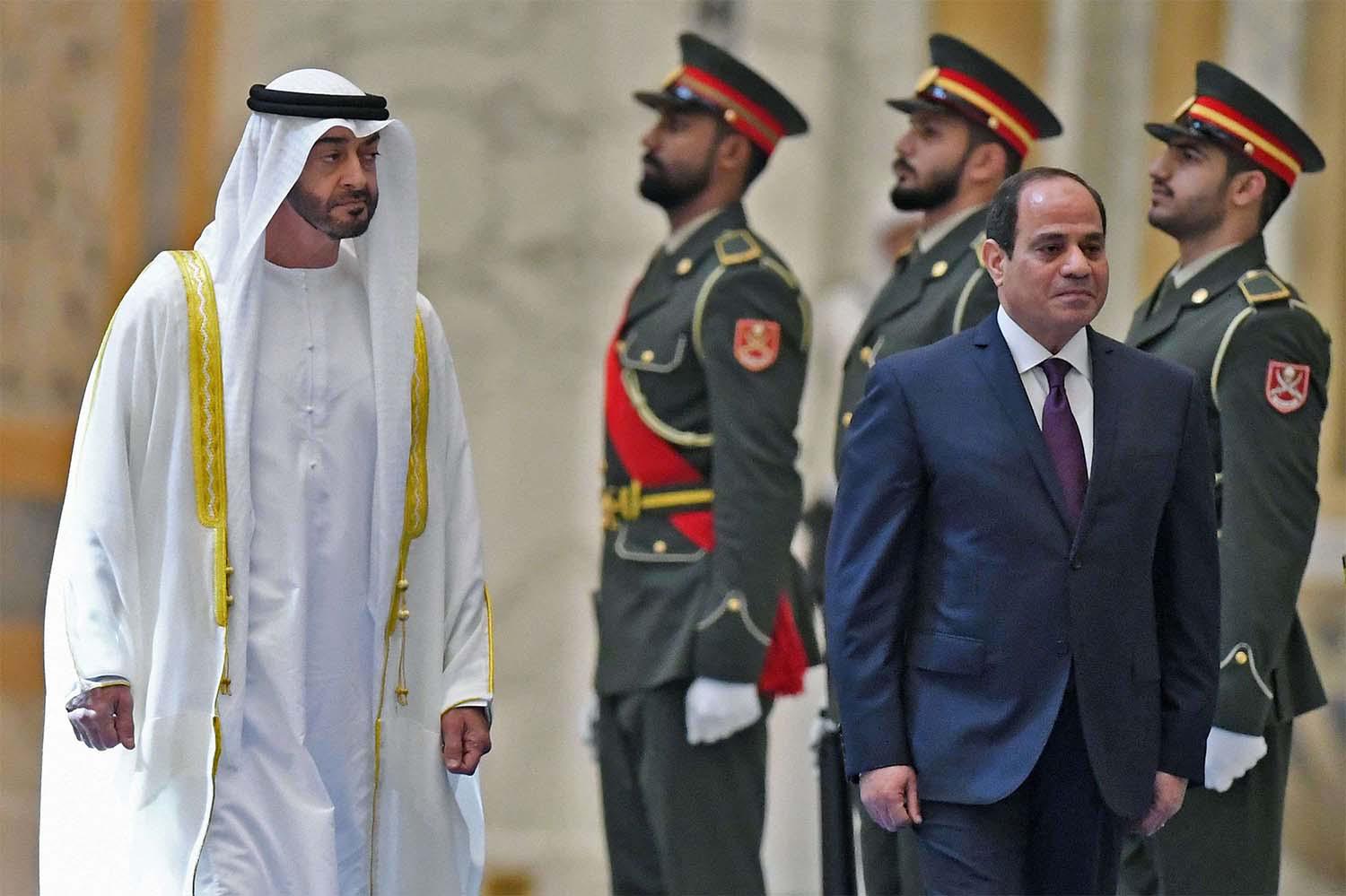 Egyptian President Abdel Fattah al-Sisi and the Crown Prince of Abu Dhabi, Sheikh Mohamed bin Zayed al-Nahyan, attend a welcome ceremony in Al-Watan presidential palace in Abu Dhabi