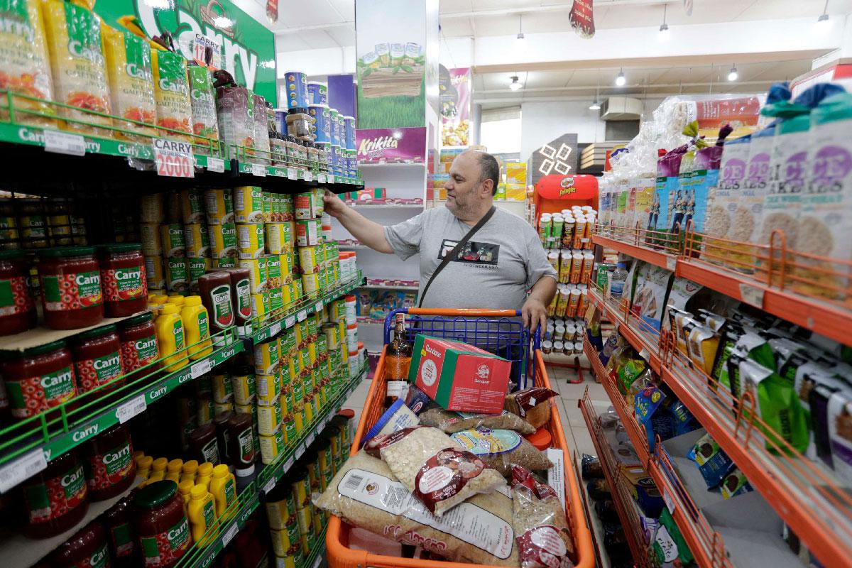 A man shops at a supermarket in the Lebanese capital Beirut on November 9, 2019