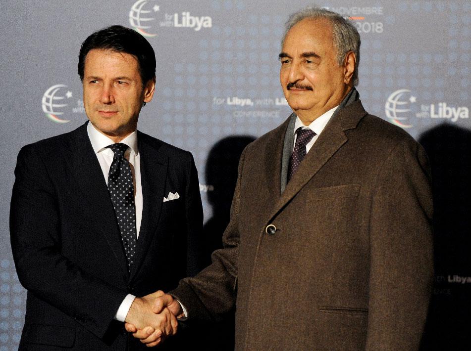Italy's Prime Minister Giuseppe Conte welcomes Libyan military commander Khalifa Haftar