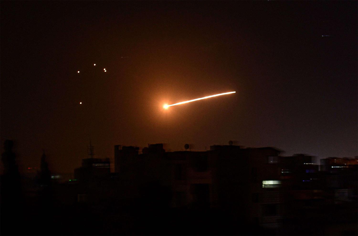 Syrian air defence intercepting an Israeli missile in the sky over the Syrian capital Damascus
