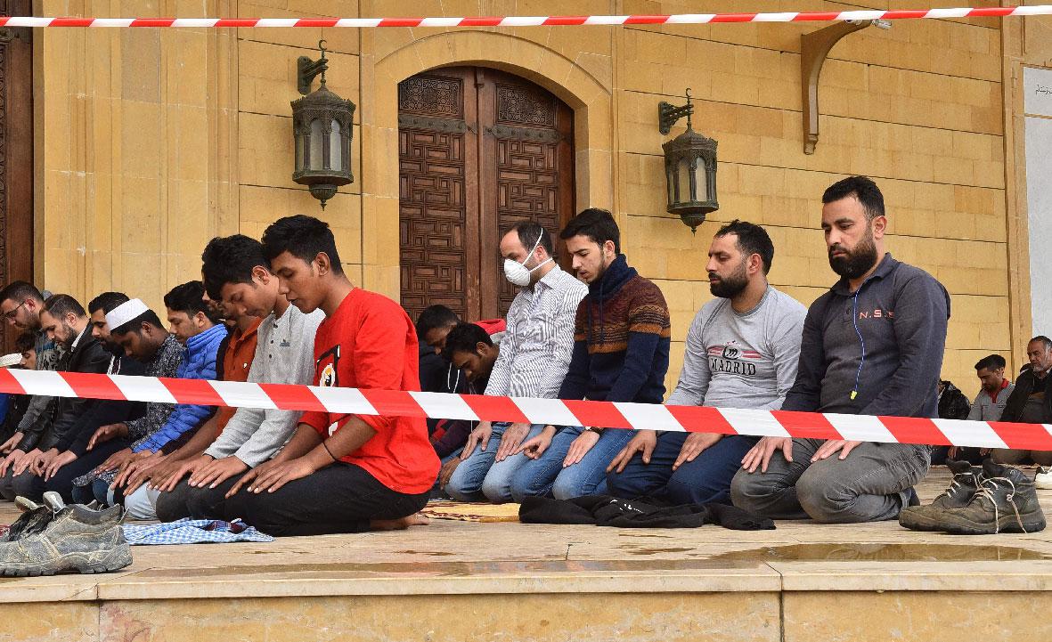 Muslim men pray at Lebanon's Sunni Mohammed Al-Amin mosque in Beirut