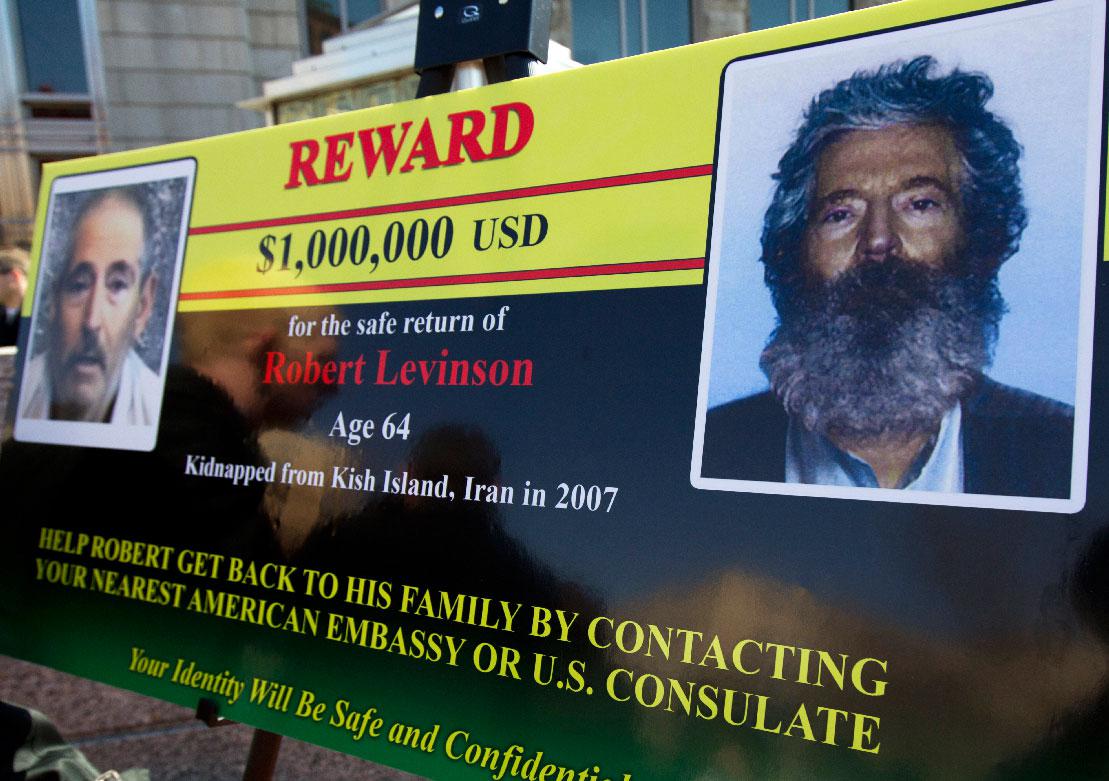 2012 photo shows an FBI poster with a composite image of former FBI agent Robert Levinson