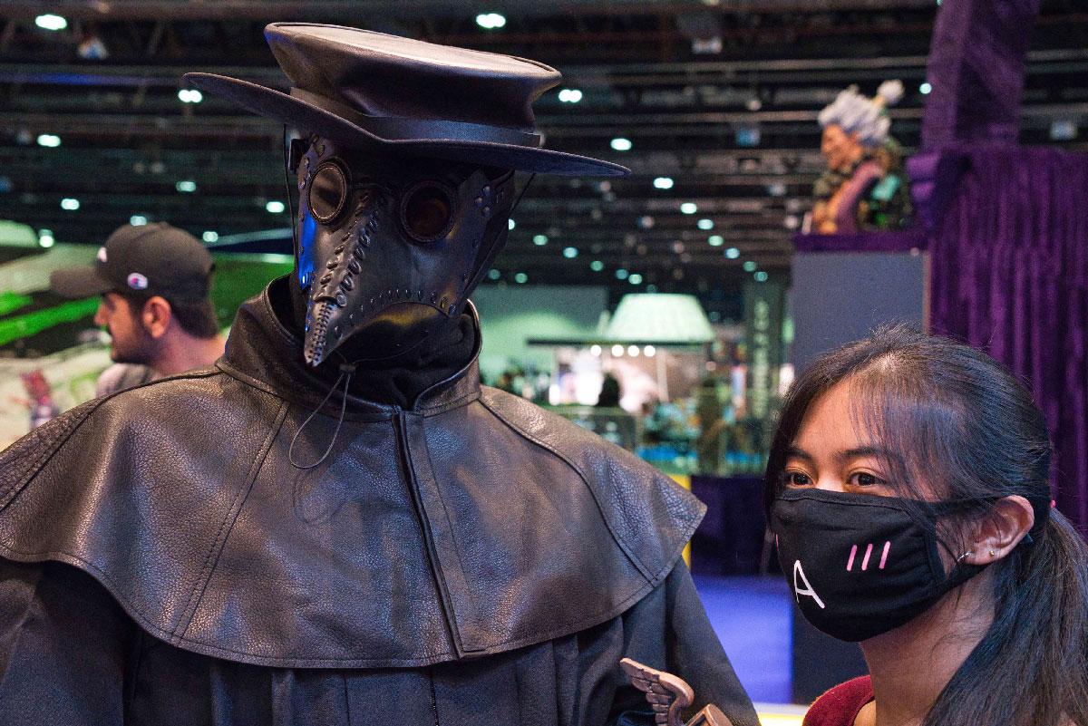 A cosplayer dressed as a plague doctor poses at the Middle East Film & Comic Con in Dubai