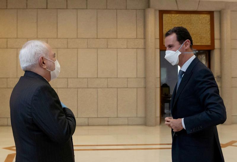 Syria’s President Bashar Assad and Iran’s Foreign Minister Mohammad Javad Zarif meet in Damascus