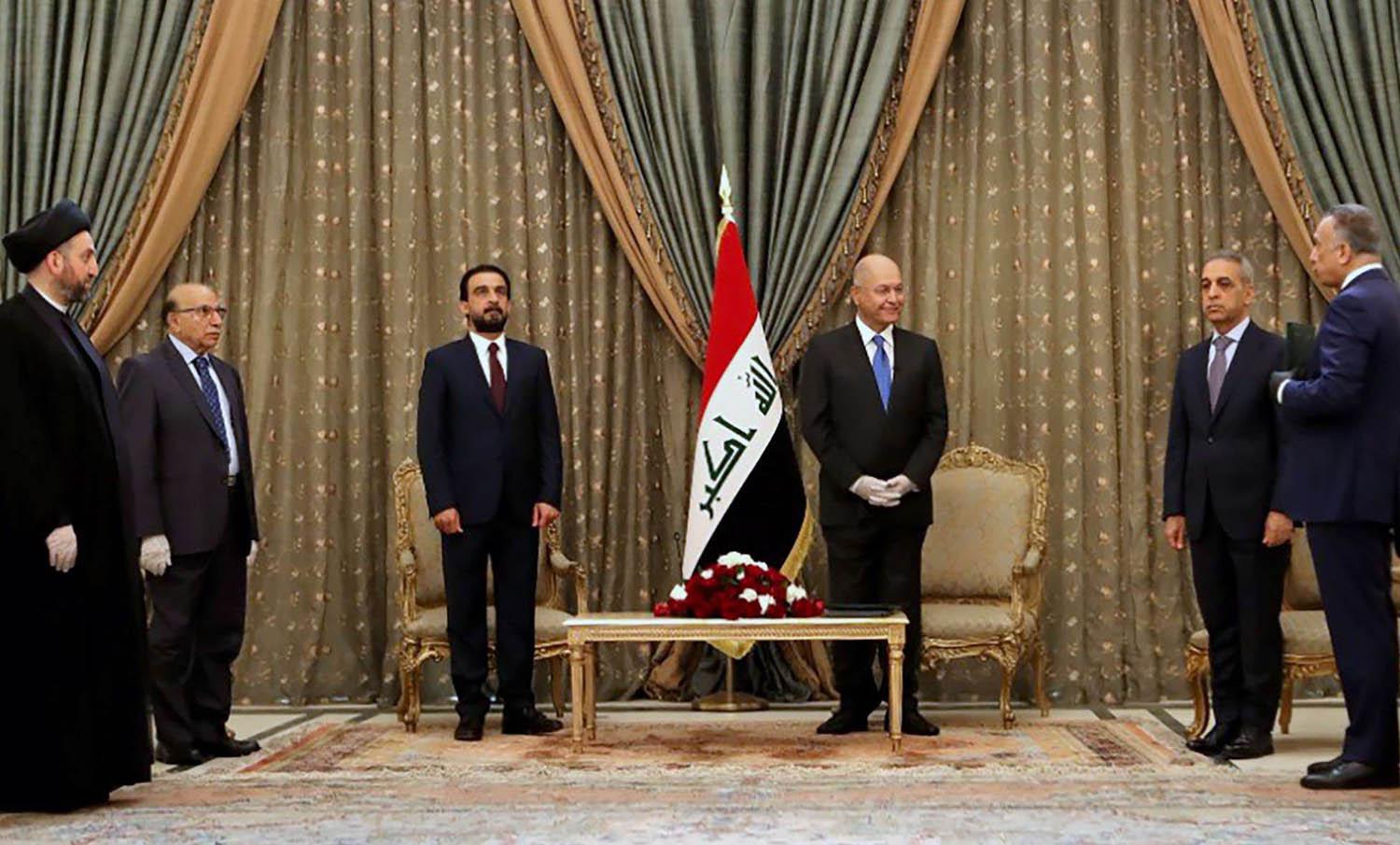 الرئيس العراقي برهم صالح اثناء تكليف مصطفى الكاظمي بتشكيل الحكومة