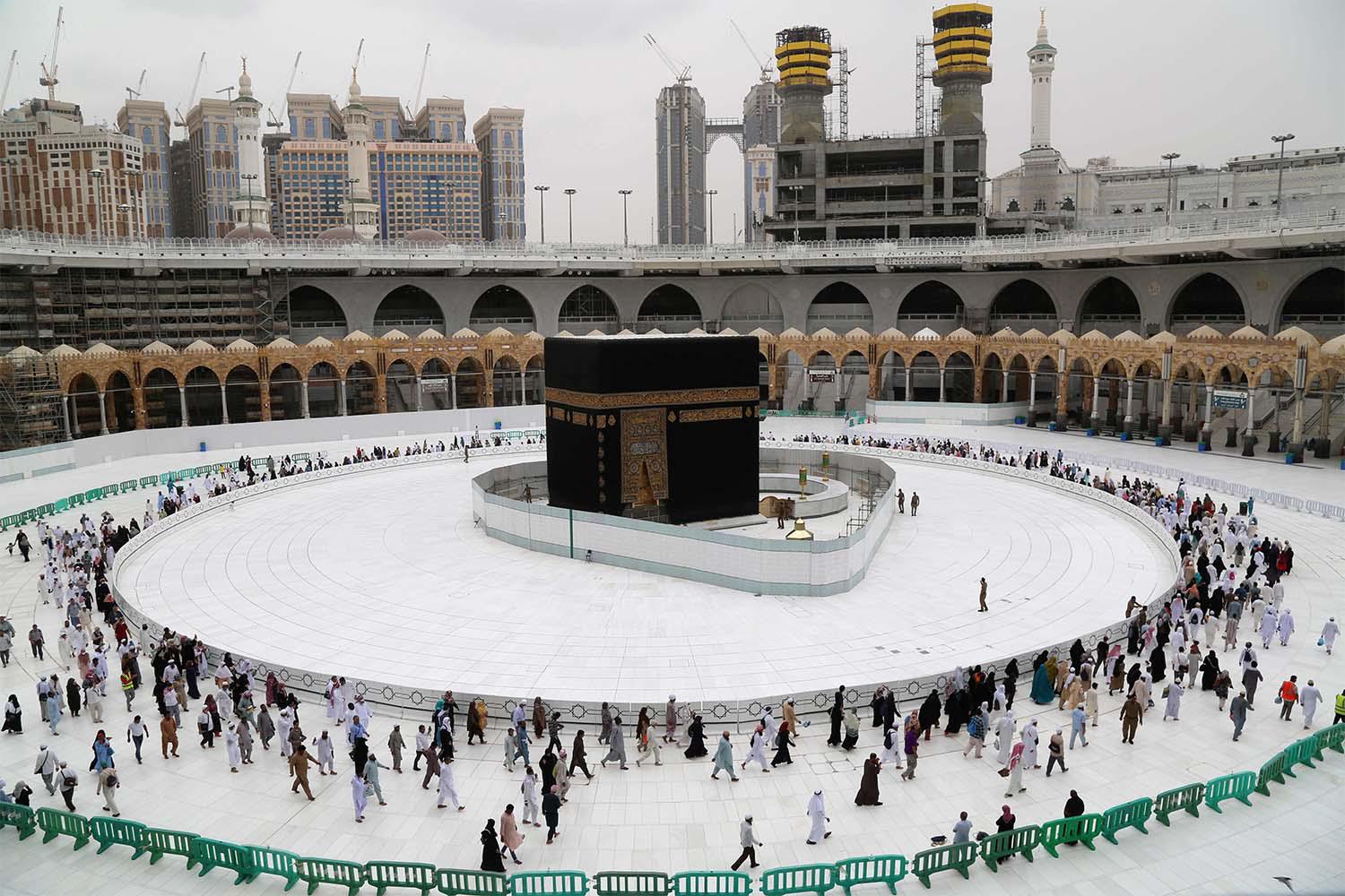 Muslim worshippers circumambulate the sacred Kaaba in Mecca's Grand Mosque