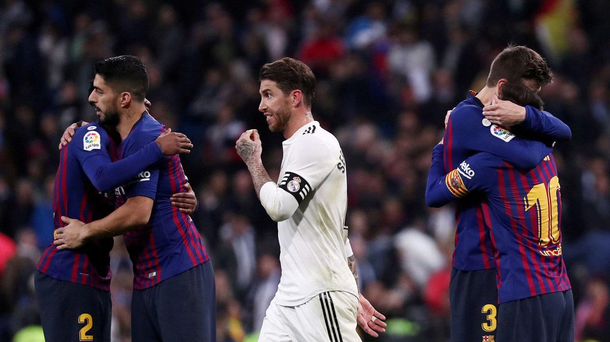 لاعبو فريقي برشلونة وريال مدريد