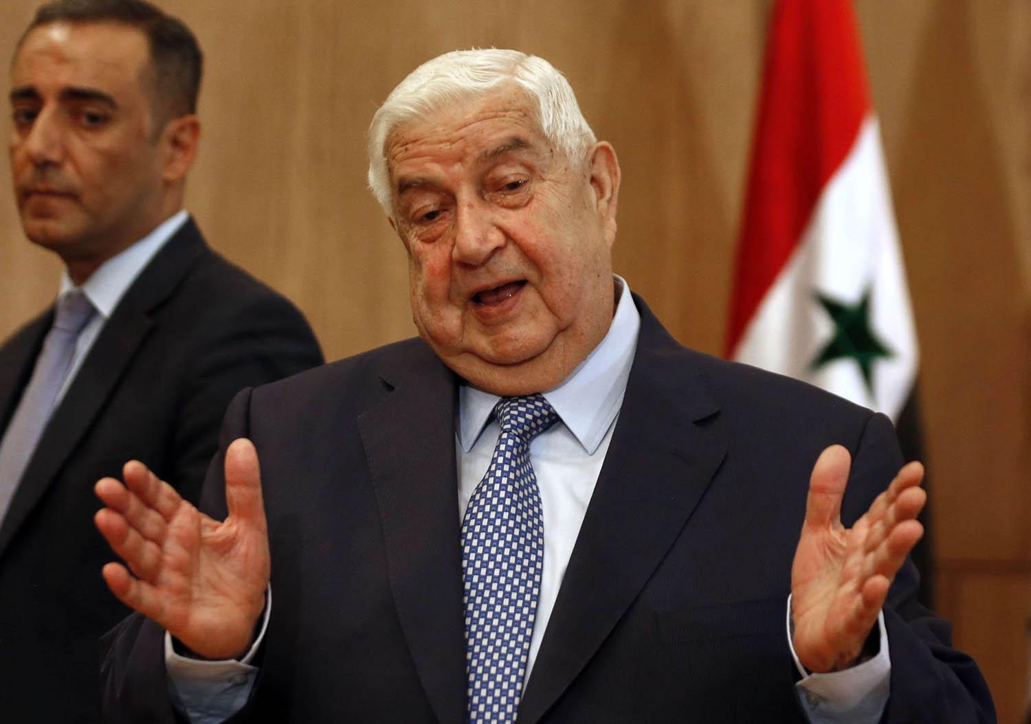 وزير الخارجية السوري وليد المعلم في مؤتمر صحفي بدمشق