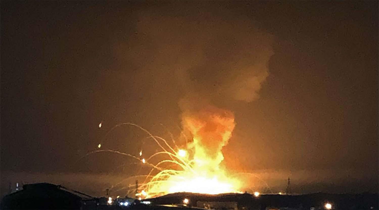 Flames seen as far away as Amman