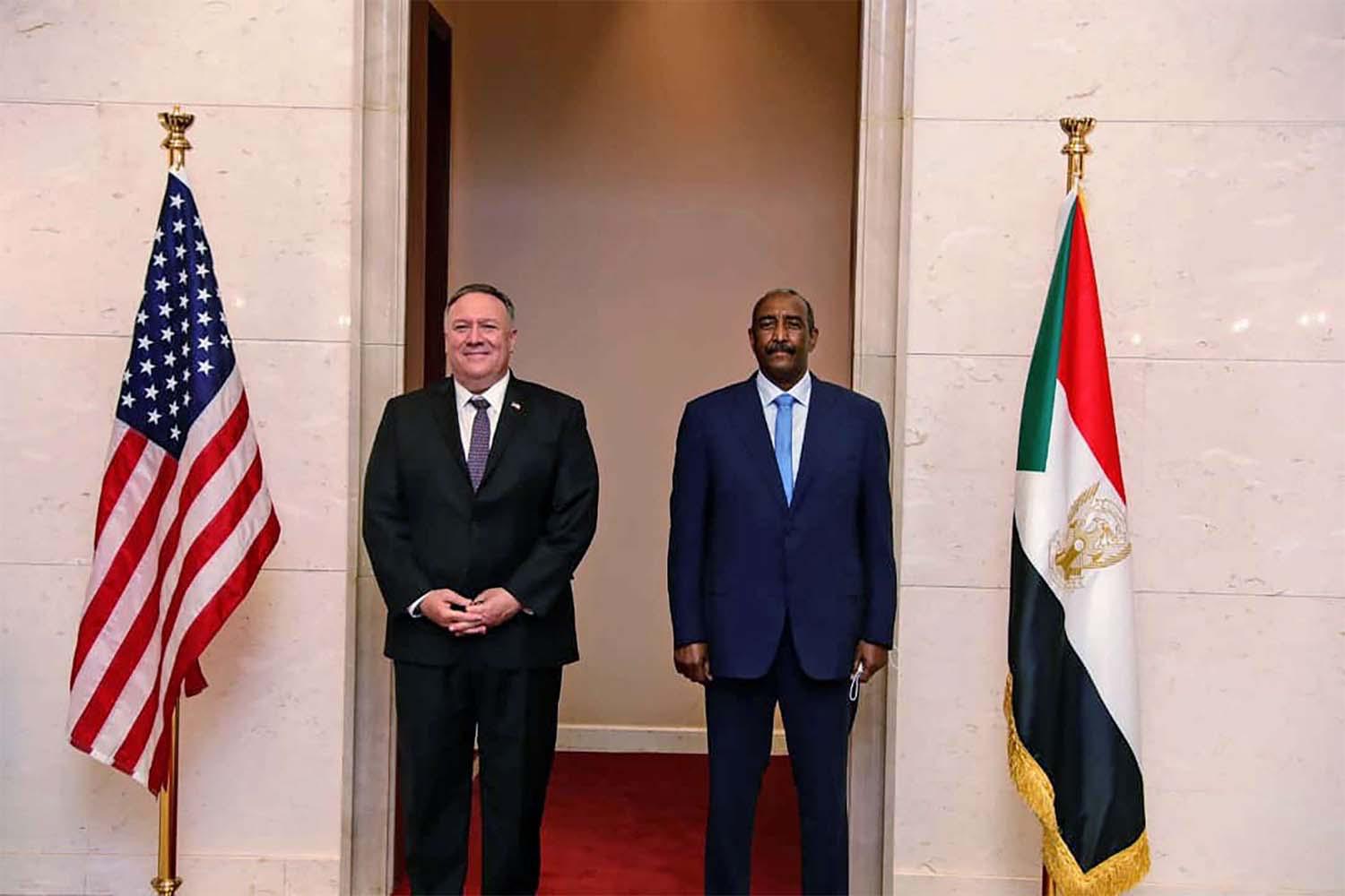 US Secretary of State Mike Pompeo stands with Sudanese Gen. Abdel-Fattah Burhan, the head of the ruling sovereign council