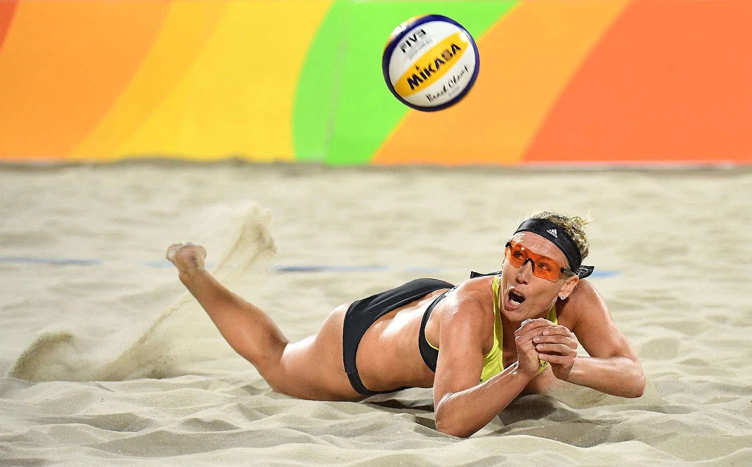 Beach volleyball players cleared to wear bikinis in Qatar event