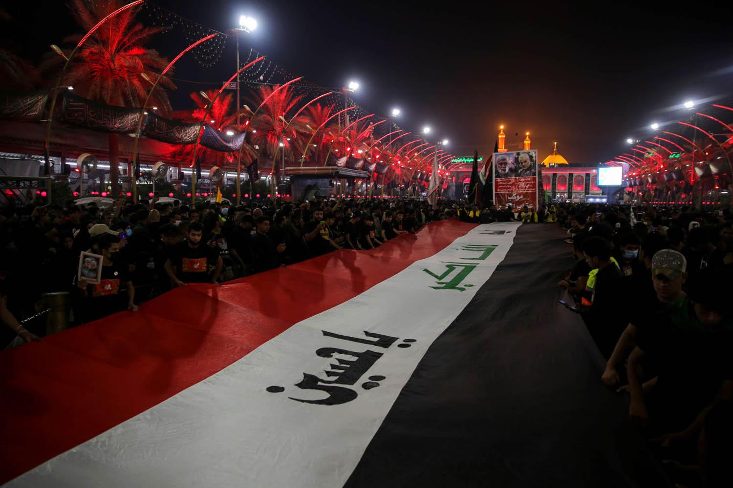 عراقيون يحيون ذكرى مقتل قاسم سليماني وأبو مهدي المهندس