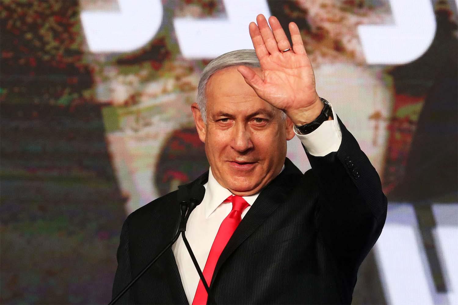 Netanyahu is charged with accepting bribes, fraud and breach of trust in three cases