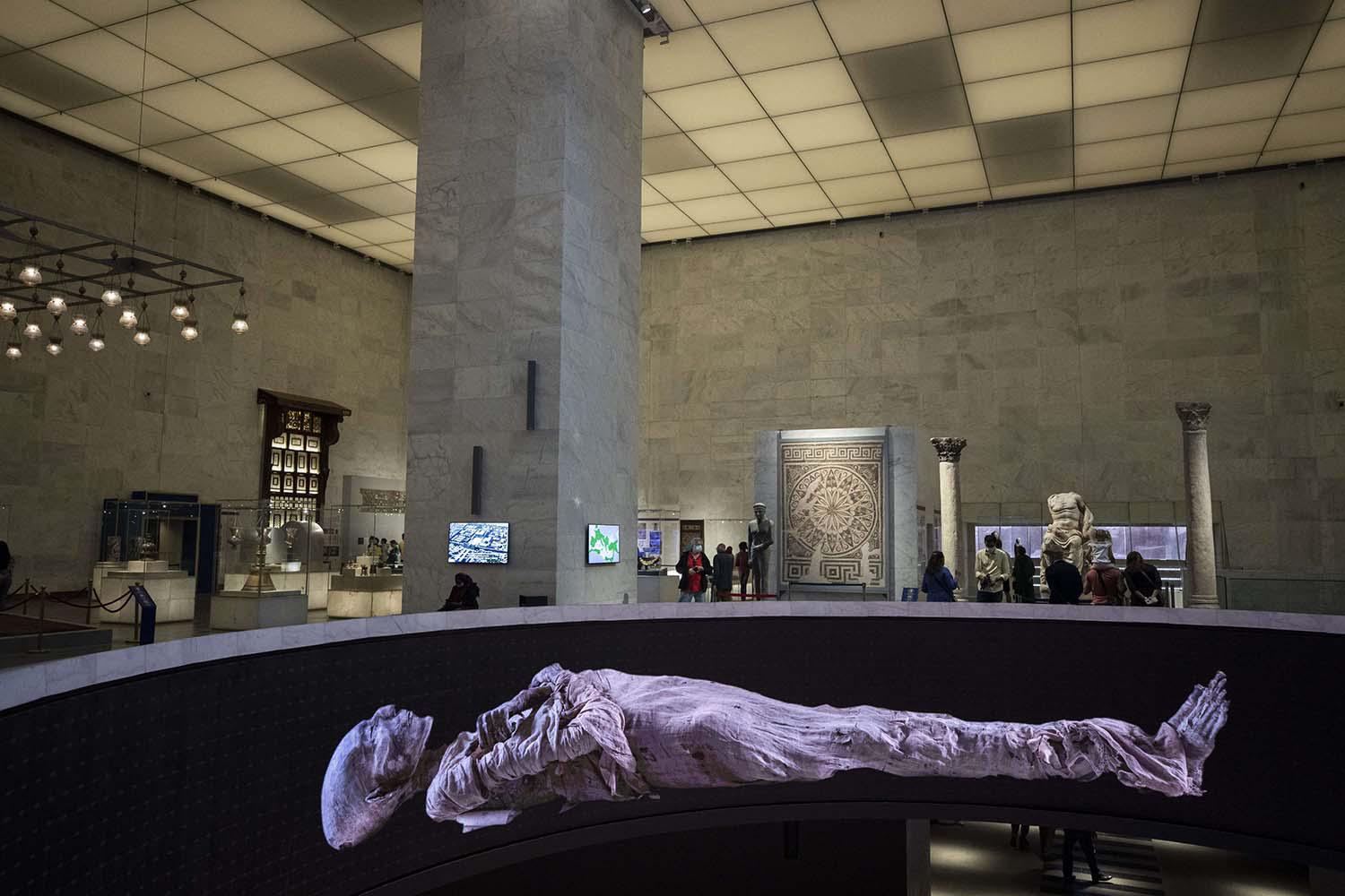 A large display of mummies at the National Museum of Egyptian Civilization in Cairo