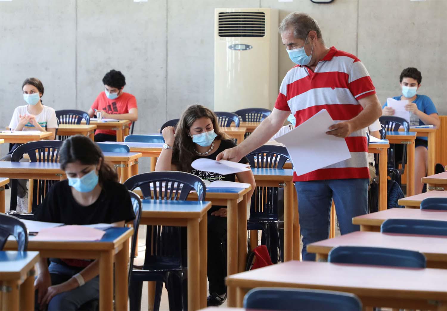 Teaching salary worth less than $90 a month as currency tumbles