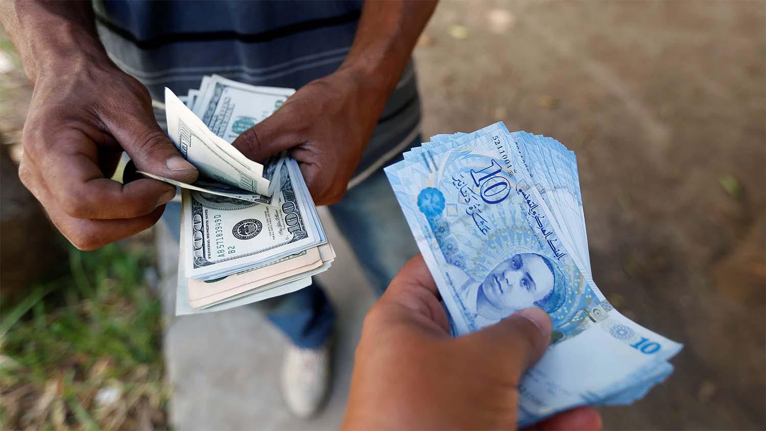 The law will reduce taxes for real estate investors and allow companies to settle foreign exchange violations by paying the fees due plus interest of 10%