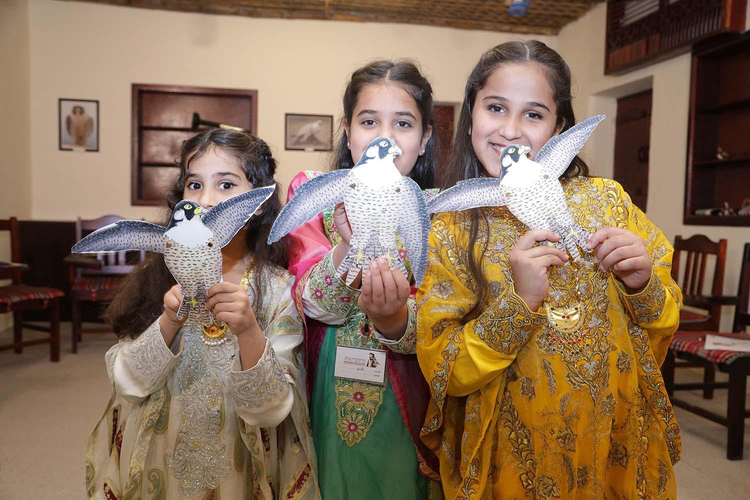 Learning about falconry from a very young age in the UAE
