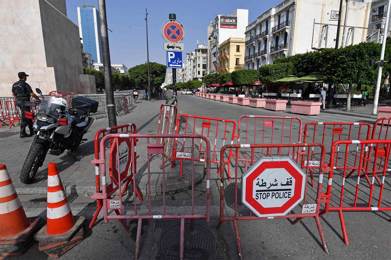 The attacker was spotted walking up and down Habib Bourguiba Avenue