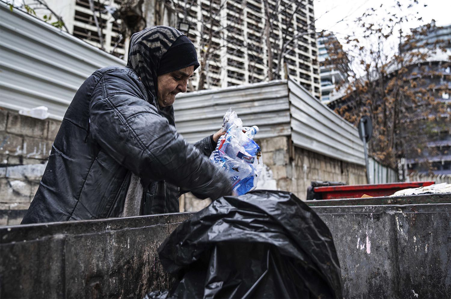 Scavenging through trash to survive