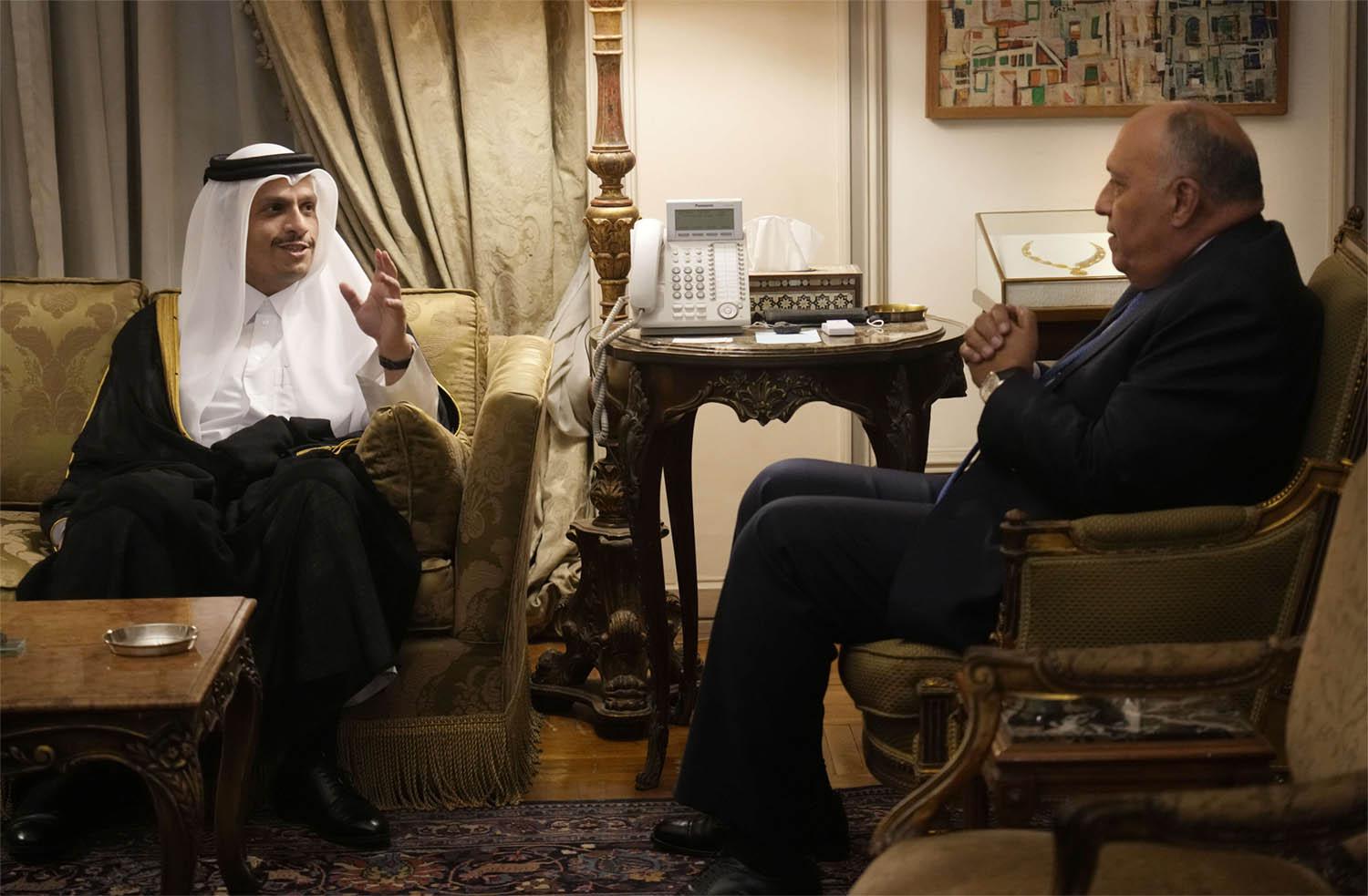 Egyptian Foreign Minister Sameh Shoukry, right, during a meeting with Qatar's Foreign Minister Sheikh Mohammed bin Abdulrahman Al Thani