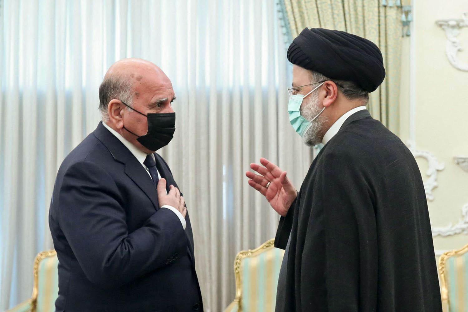 الرئيس الإيراني إبراهيم رئيسي يستقبل وزير خارجية العراق فؤاد حسين