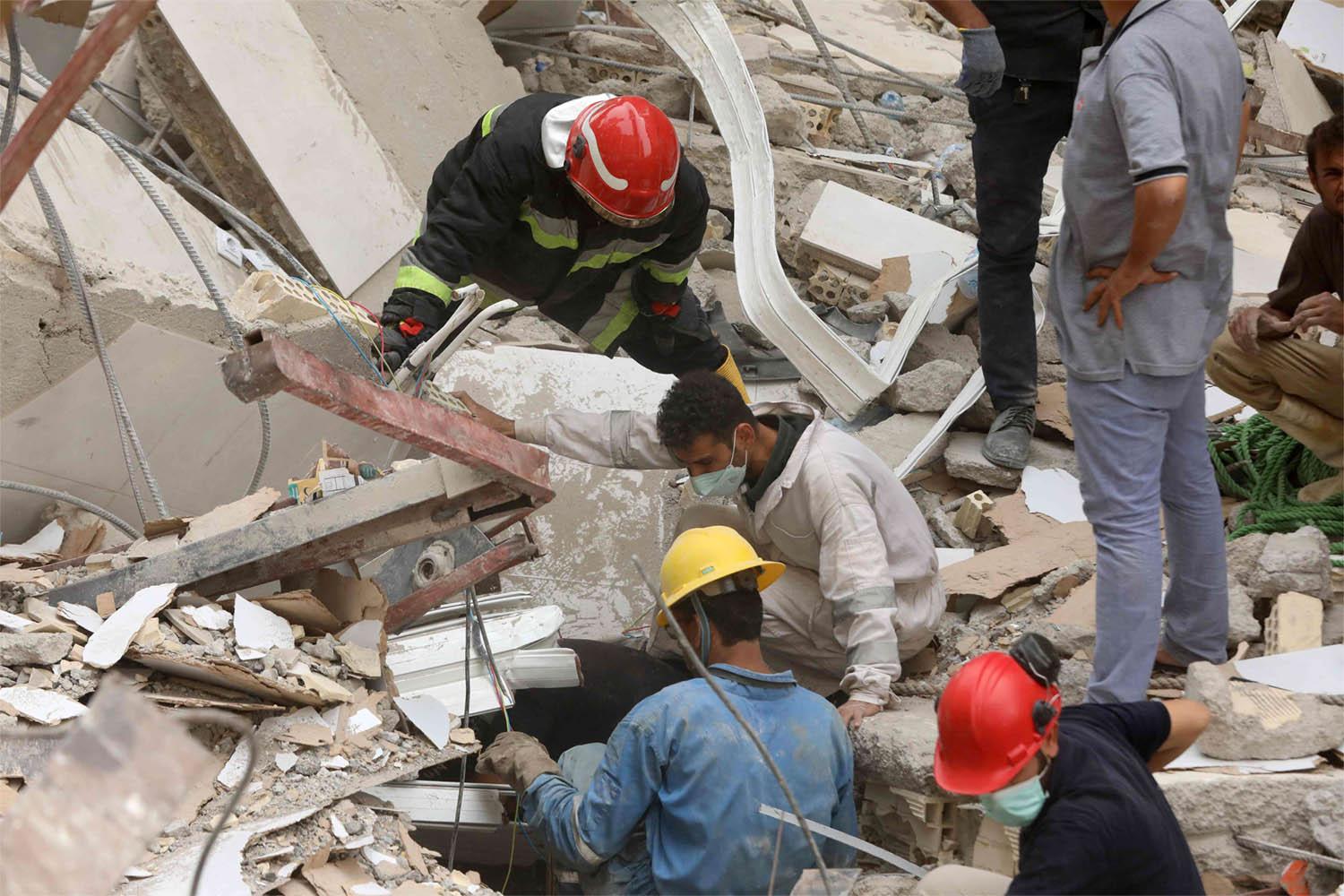 Two more bodies were pulled from the rubble 