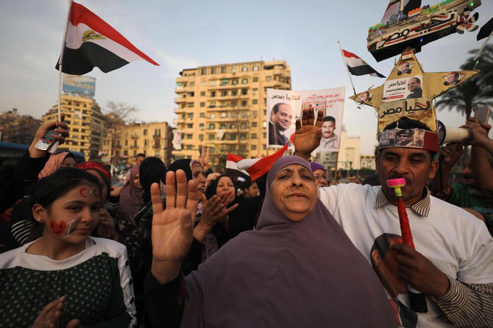 مصريون يحتفلون بإعادة انتخاب السيسي رئيسا لمصر في 2018
