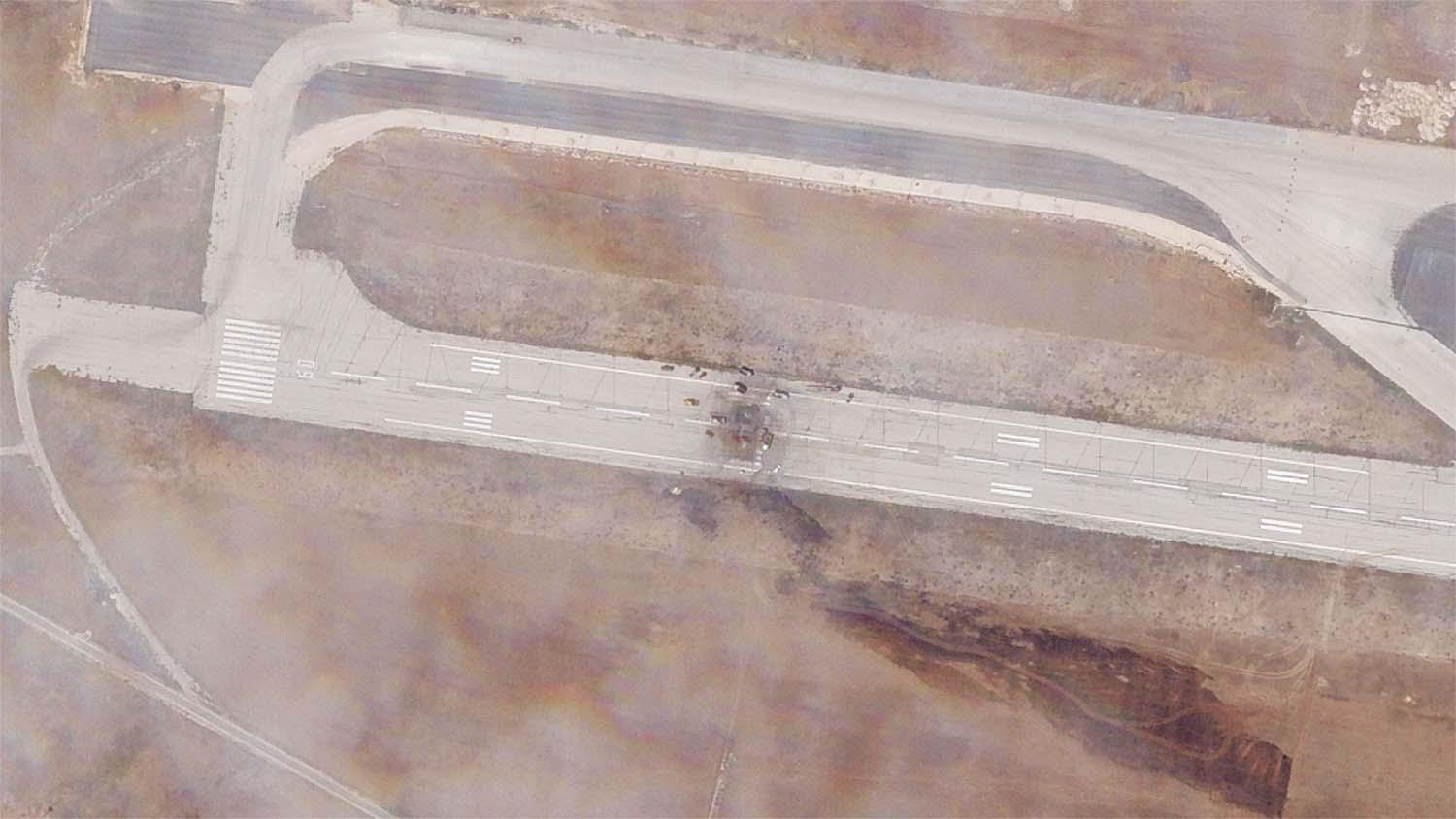 The runway damage after an Israeli strike targeted the Aleppo International Airport