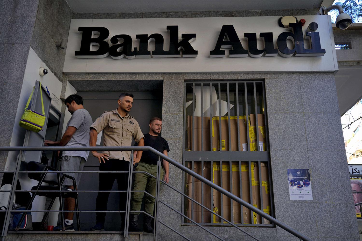 Crowds of anxious Lebanese gathered around ATM machines