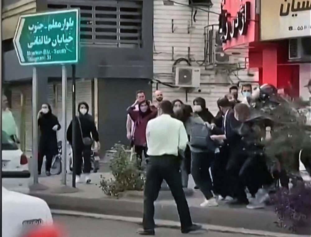 Female protesters are being roughly handled by Iranian security forces in the city of Rasht