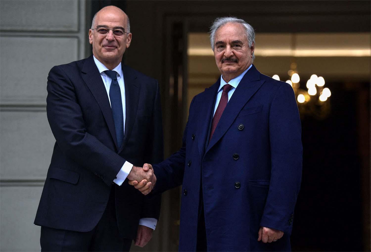 Greek Foreign Minister Nikos Dendias welcomed Libyan strongman Khalifa Haftar before talks in Athens in January 2020