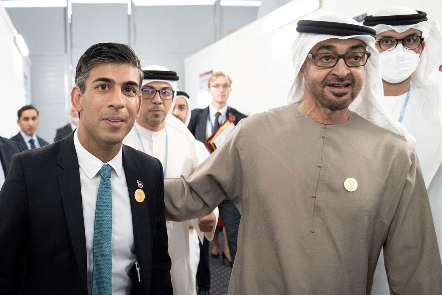 Sheikh Mohamed bin Zayed al-Nahyan (R)