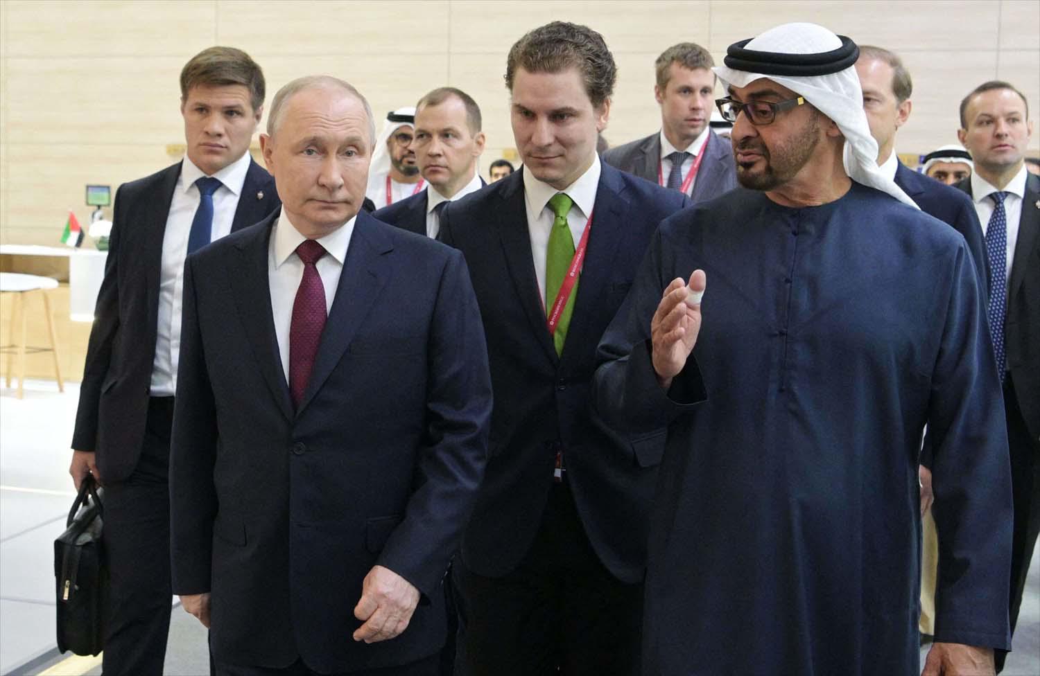 Russian President Vladimir Putin and UAE President Sheikh Mohamed bin Zayed al-Nahyan tour the UAE pavilion at the Saint Petersburg International Economic Forum 