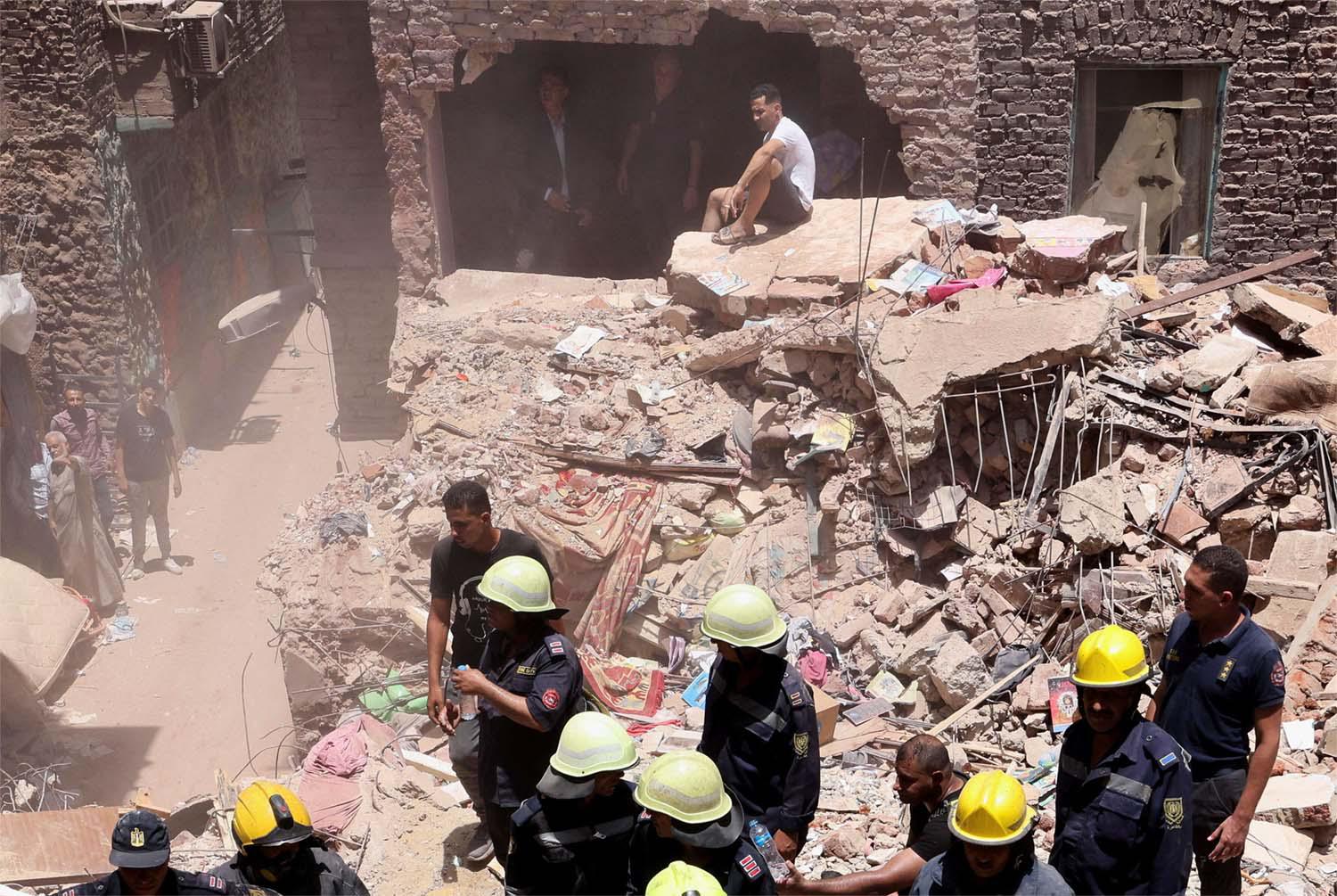 The rubble of a five-story apartment building that collapsed