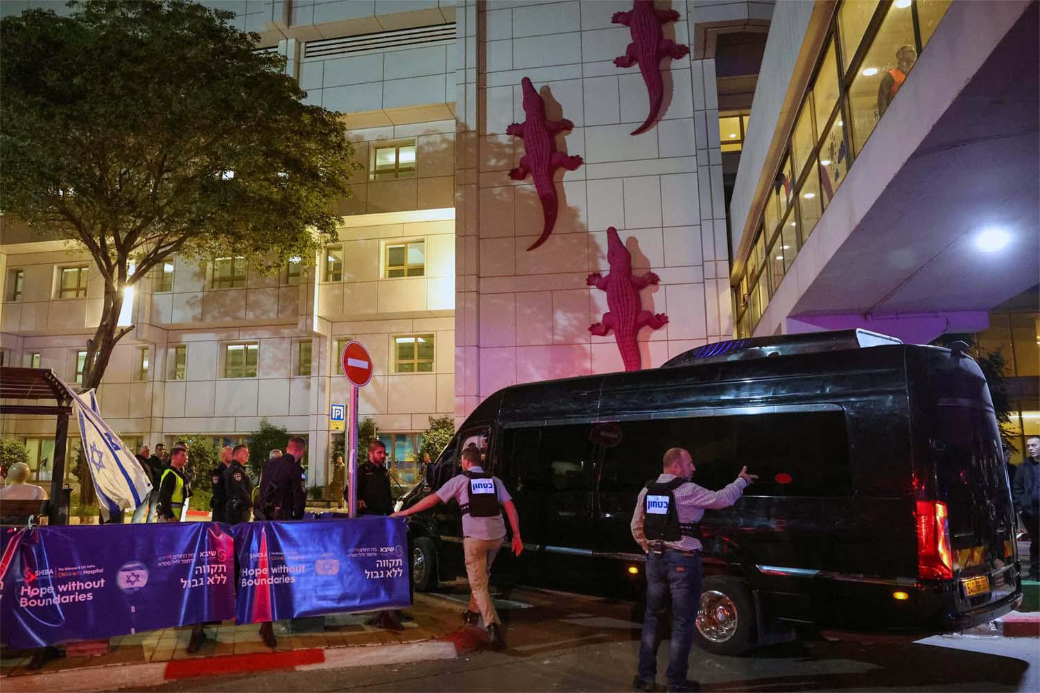 A vehicle carrying Isareli hostages released by Hamas from the Gaza Strip arrives at the Sheba Medical Center in Ramat Gan