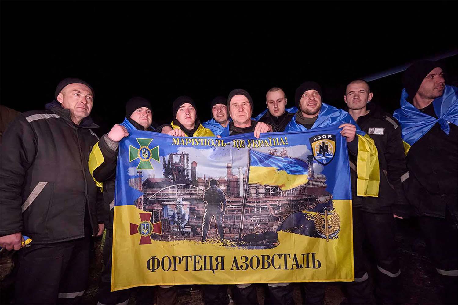 krainian prisoners of war posing for a photo following a swap at an undisclosed location in Ukraine