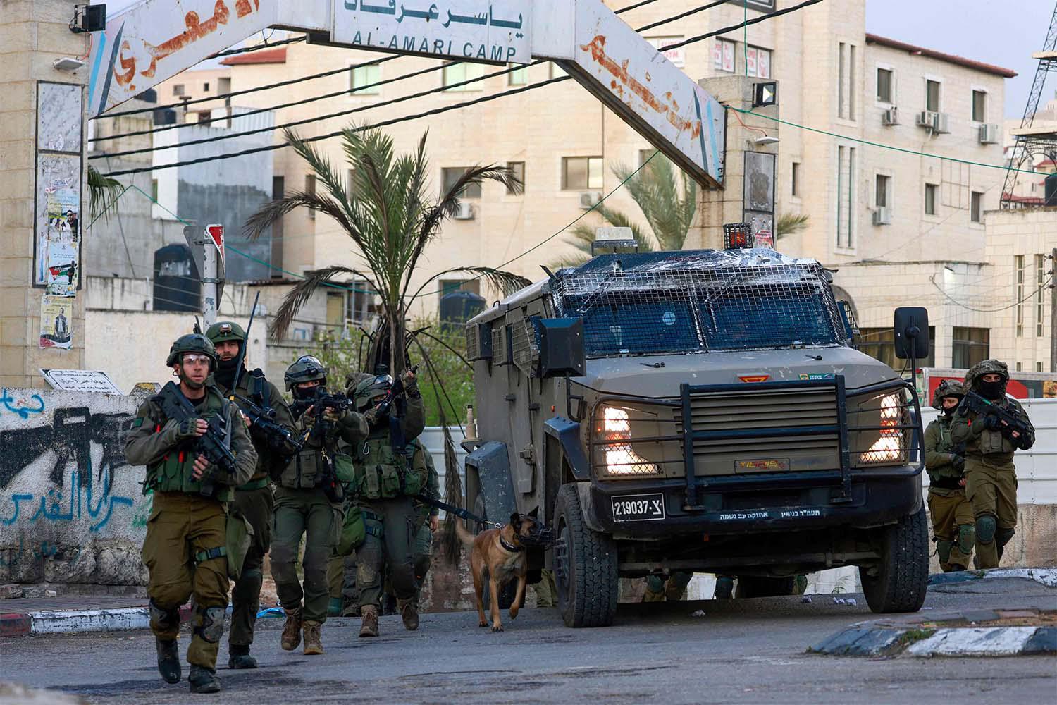 Israeli forces detained at least 55 Palestinians in raids across the West Bank overnight