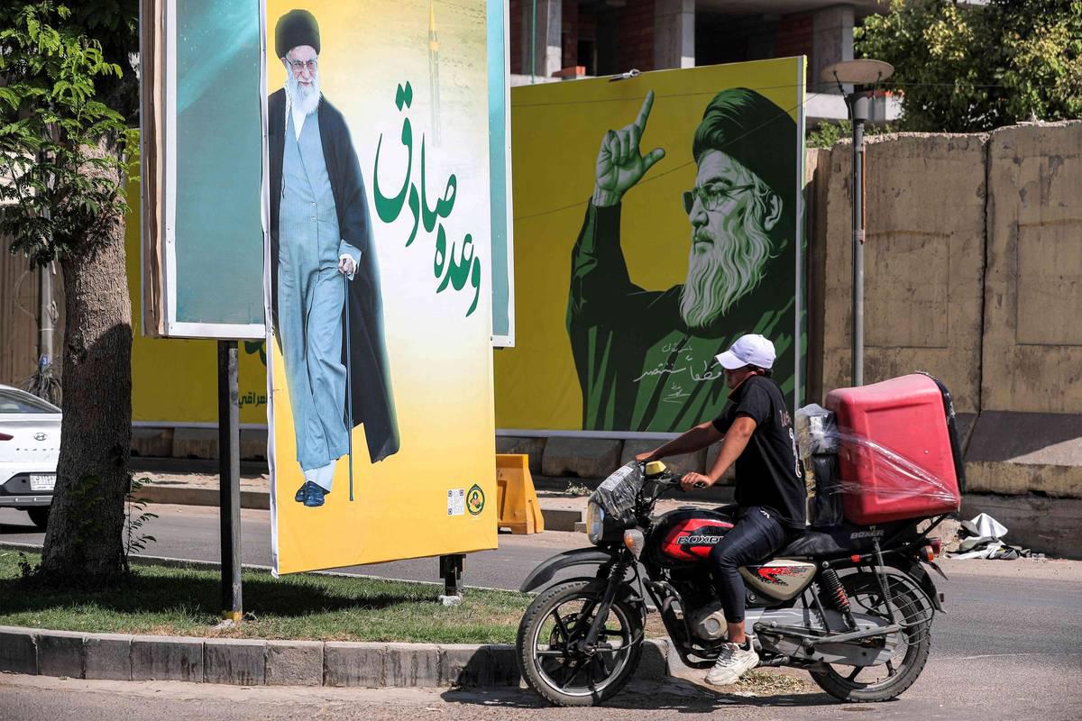 جداريات في بغداد للمرشد الأعلى علي خامنئي وزعيم حزب الله الراحل حسن نصرالله